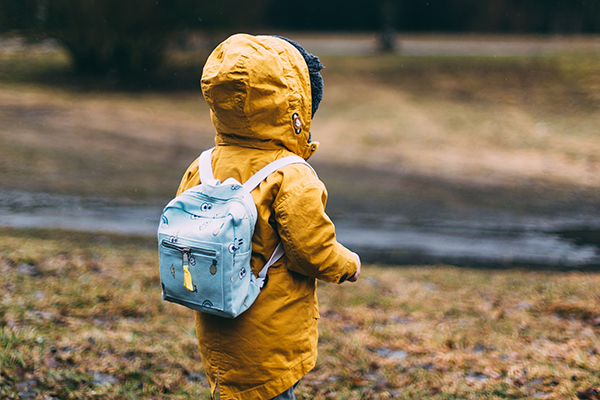 small boy with a backpack