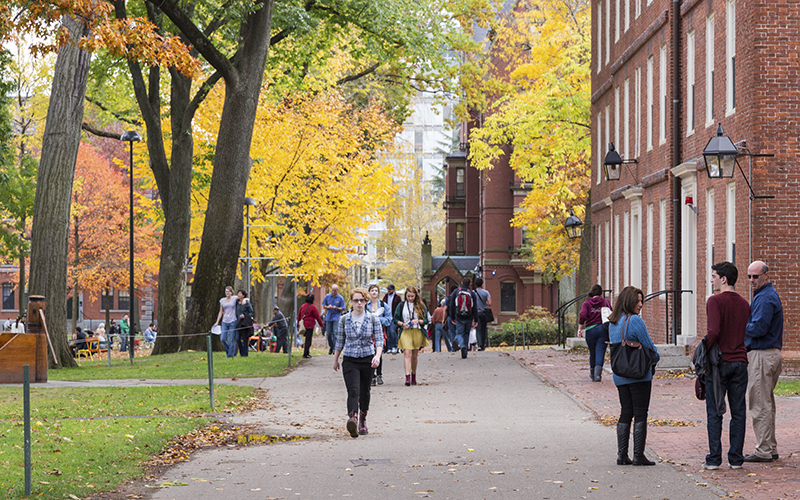 students walking on a college campus