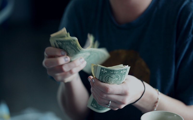 woman counting money